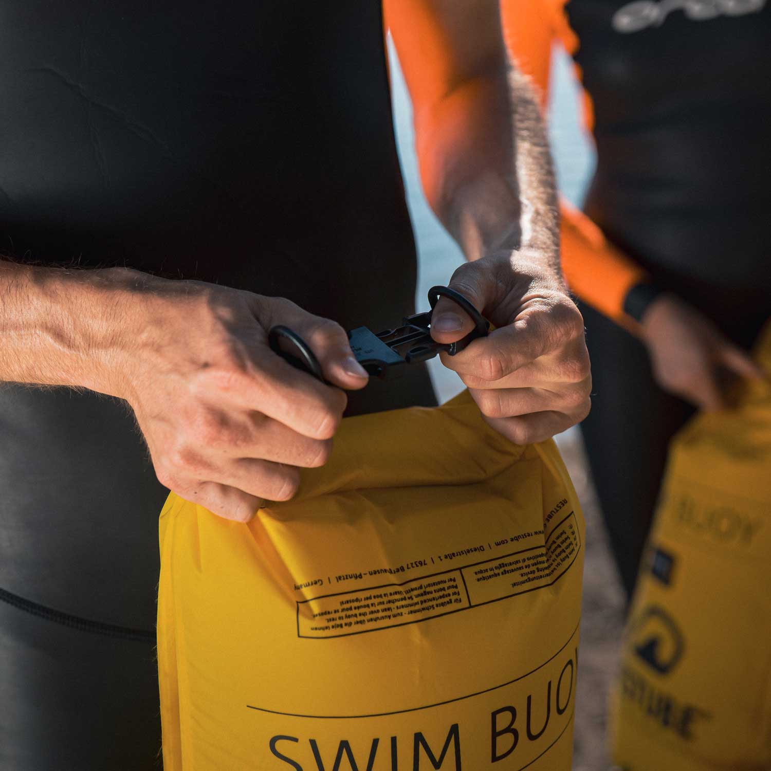 Close up of the closing mechanism of the swim buoy